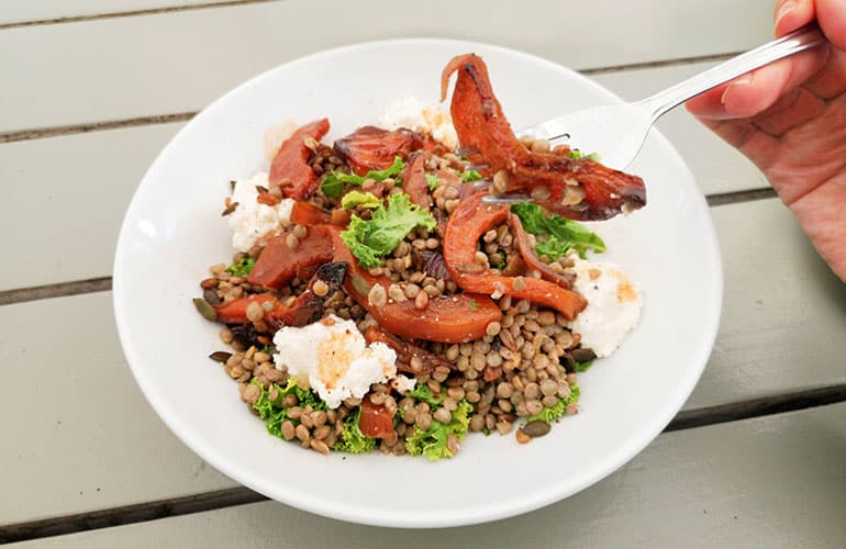POV of woman eating lentil salad