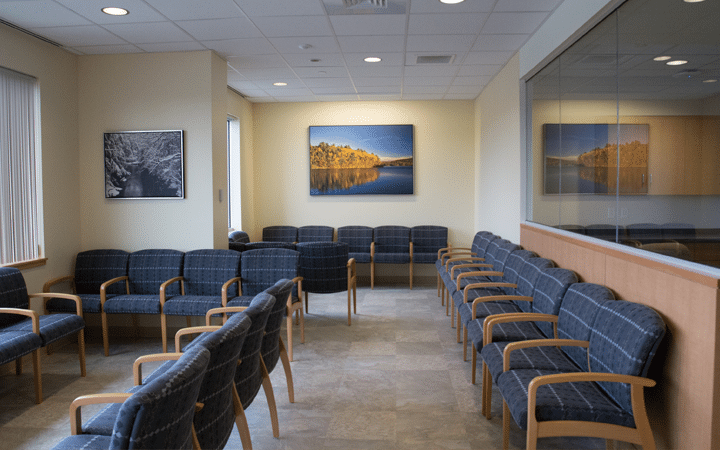 Waiting room lined with chairs