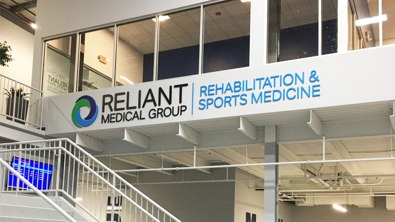 Inside the ice rink, logo that says 