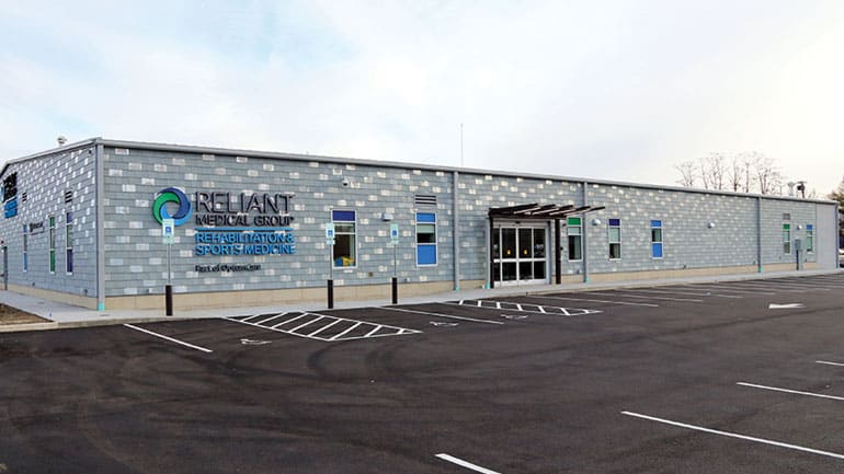 Exterior of a building with Reliant Medical Group Rehab logo on the front