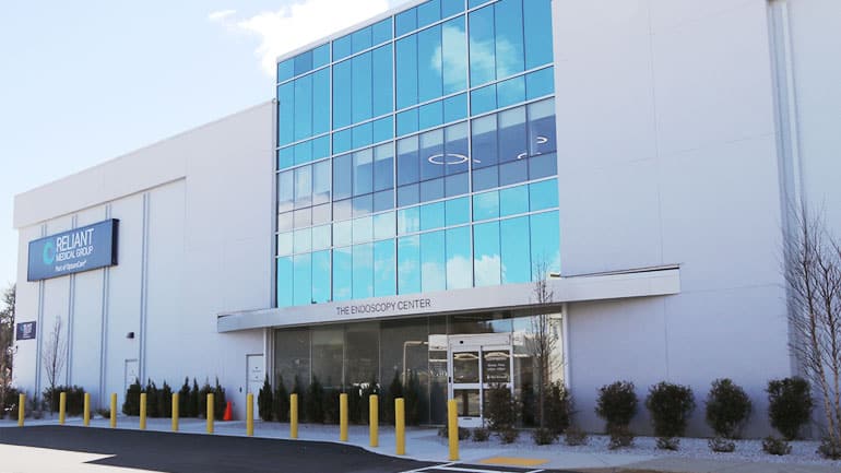 Exterior of a building with a sign that reads 